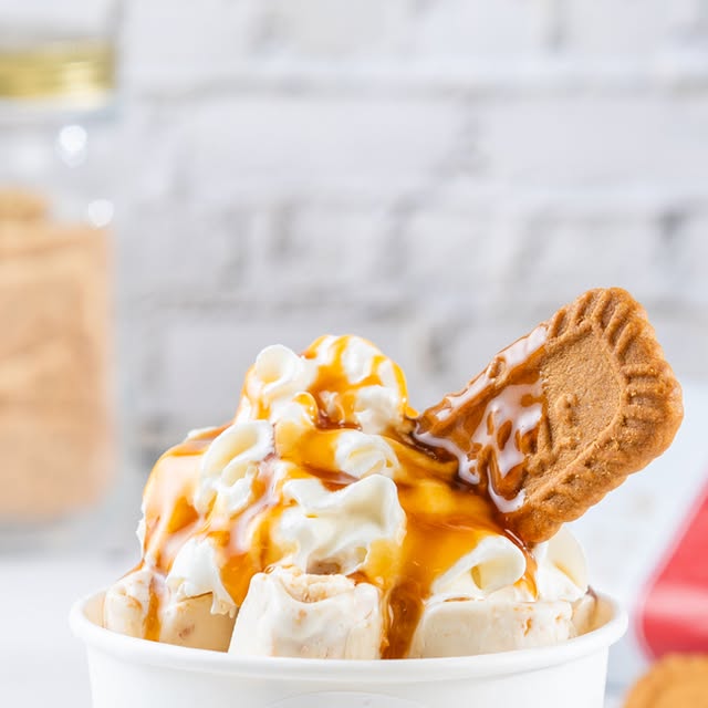 Biscoff ice cream rolls with caramel drizzle and Lotus cookie